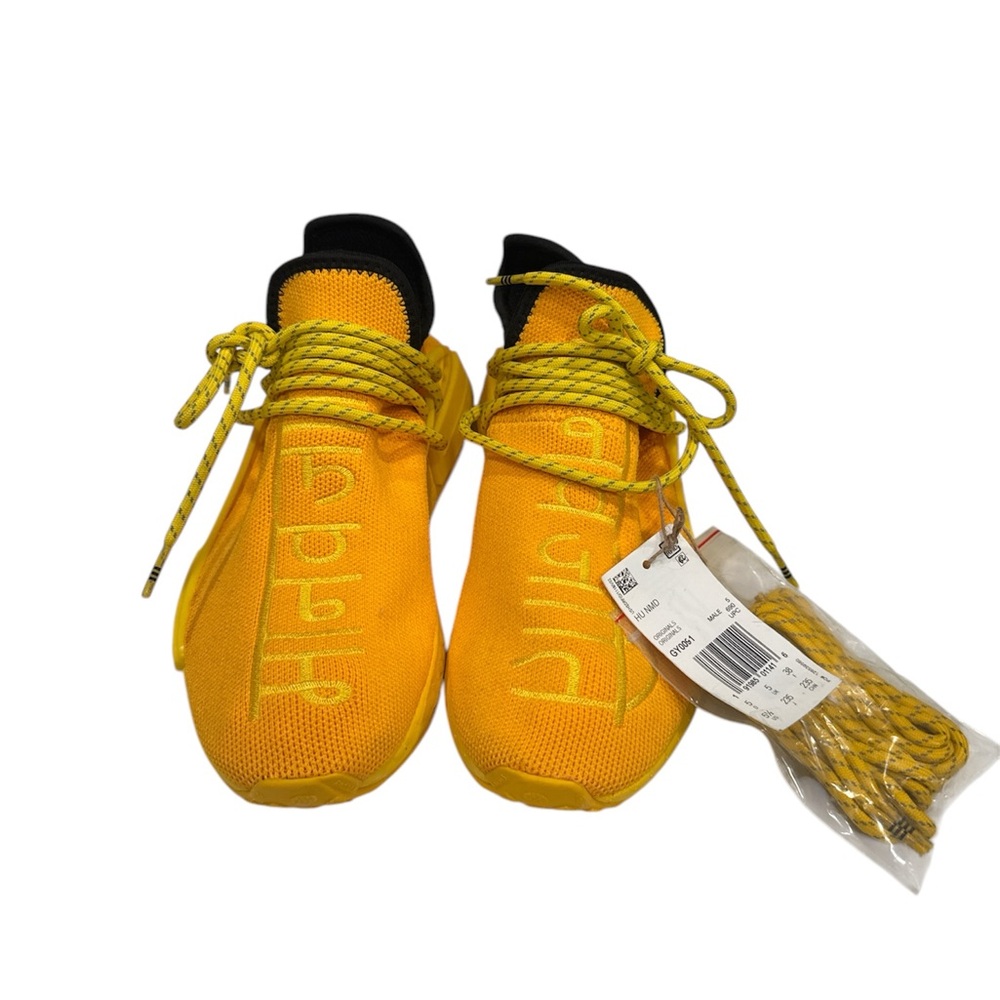 adidas
x Pharrell Hu NMD "Bold Gold/Yellow" sneakers